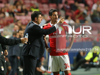 Benficas head coach Rui Vitoria from Portugal (L) and Benficas defender Andre Almeida from Portugal (R) during the SL Benfica v CSKA Moskva...