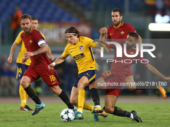 Groggier Defrel of Roma tackling on Filipe Luis of Atletico during the UEFA Champions League Group C football match between AS Roma and Atle...