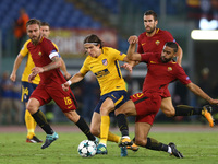 Groggier Defrel of Roma tackling on Filipe Luis of Atletico during the UEFA Champions League Group C football match between AS Roma and Atle...