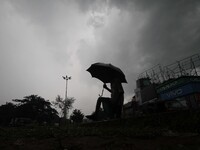 Rain clouds hover in the sky before downpour in the eastern Indian state Odisha's capital city Bhubaneswar on 13 September 2017. (