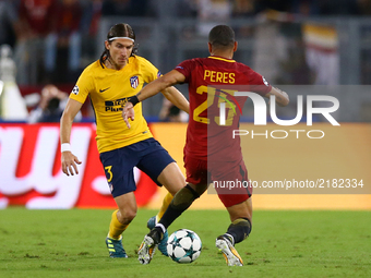 
Filipe Luis of Atletico tackling on Bruno Peres of Roma  during the UEFA Champions League Group C football match between AS Roma and Atleti...