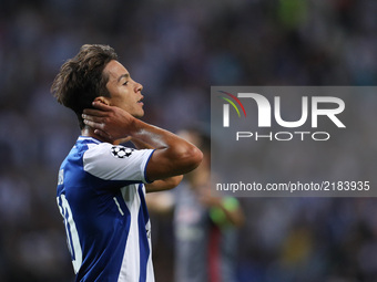 Porto's Spanish midfielder Oliver Torres reacts during the FC Porto v Besiktas - UEFA Champions League Group G round one match at Dragao Sta...