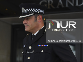 Police commander Stuart Cundy is seen while he leaves after attending the opening statements of the Inquiry into the Grenfell Tower fire dis...