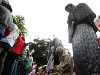 Muslim protesters perform afternoon prayers (Jummah) during a rally against alleged US involvement in military operations, near the US Embas...