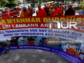 Sri Lankan monks and activists who support  Myanmar's Buddhist community and  Myanmar's  leader Aung San Suu Kyi,  walks in 
 procession du...