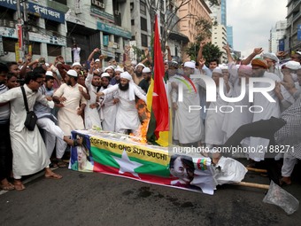 The several Islamist political organization in Bangladesh bring out protest rally and burn Myanmar flag and Aung San Suu Kyi  poster in Dhak...