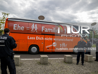 The bus is protected by police on arrival in Berlin, Germany, on 15 September 2017. The bus tour of the so-called 