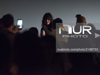 Daisy Lowe poses for the photographers before attending the Eudon Choi show during London Fashion Week September 2017 at BFC Show Space on S...