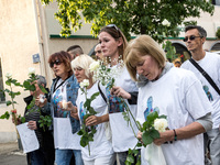Solemn march in homage to Aurélie Dran, twenty nine years old and mother of three children aged eight to three years, killed on August 11, 2...