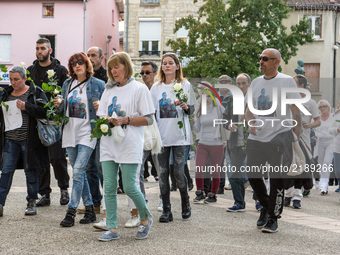 Solemn march in homage to Aurélie Dran, twenty nine years old and mother of three children aged eight to three years, killed on August 11, 2...