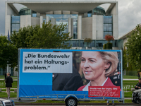 An election poster of the candidate Ursula von der Leyen  of the right-wing populist party (AfD) for the german Bundestag election at a stre...