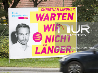An election poster of the main candidate of the right-liberal Freie Demokratische Partei (Free democratic party, FDP) Christian Lindner is p...