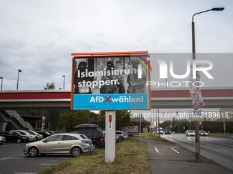 An election poster of the populist right-wing Alternative fuer Deutschland (Alternative for Germany, AfD) party reading 'stop islamization'...