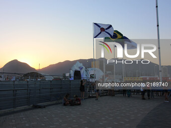 People arrive at the City of Rock on the first day of 