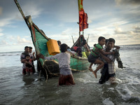 Myanmar Rohingya refugees are seen after arriving on a boat to Bangladesh on Shah Porir Dip Island Teknaf, Bangladesh 14 September 2017. Acc...