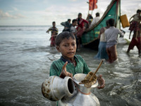 Myanmar Rohingya refugee boy are seen after arriving on a boat to Bangladesh on Shah Porir Dip Island Teknaf, Bangladesh 14 September 2017....