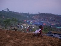 Rohingya boy play in front of his makeshift tent at the Thenkhali refugee camp in Cox’s Bazar, Bangladesh September 16, 2017. Around 370,000...