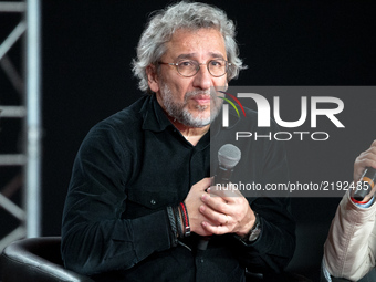 Turkish journalist, columnist and documentarian Can Dündar, takes part in a debate during the Festival of Humanity (Fete de l'Humanite), a p...