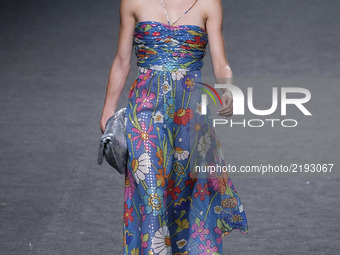 A model walks the runway at the Maria Escote show during the Mercedes-Benz Fashion Week Madrid Spring/Summer 2018 at Ifema on September 17,...