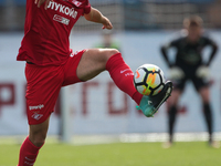 Mario Pasalic of FC Spartak Moscow vie for the ball during the Russian Football League match between FC Tosno and FC Spartak Moscow at Petro...