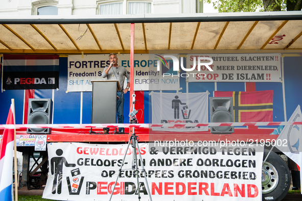 Edwin Wagensveld, Dutch leader of PEGIDA (Patriotic Europeans Against the Islamisation of the West) speaks during a demonstration starting a...