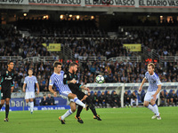 Llorente R of Real Sociedad duels for the ball with Sergio Ramos of Real Madrid during the Spanish league football match between Real Socied...