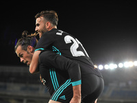 Bale of Real Madrid celebrates with teammates after scoring during the Spanish league football match between Real Sociedad and Real Madrid a...
