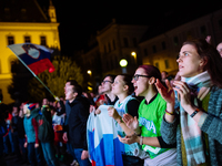 Fans celebrating in Ljubljana, Slovania, on September 17, 2017 after Slovenian basketball team historical win in European Championship in Is...