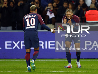 Kylian Mbappe of PSG celebrates his goal with Neymar Jr during the Ligue 1 match between Paris Saint Germain and Olympique Lyonnais at Parc...