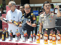 Metro Jaya Police Chief Inspector General of Police Idham Azis (right), along with Director General of Customs Heru Pambudi (midle), showed...
