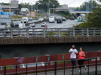 Runners near an highway in toulouse. The peer-review Environmental Research Letters published an article monday on air pollution and 'diesel...