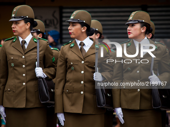 Osorno, Chile. 18 September 2017. Female police take part in the military parade. Armed forces participate in the traditional military parad...