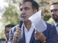 Former Georgian President and former Odessa Region Governor Mikheil Saakashvili and his lawyers in front of the Presidential Office building...