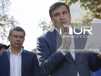 Former Georgian President and former Odessa Region Governor Mikheil Saakashvili (R) and his lawyers in front of the Presidential Office buil...