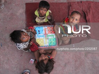 Children play in Delhi, India, on 19 September 2017. (