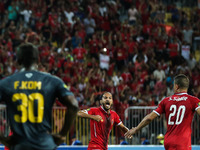 Alsaid of Al-Ahly scores a penalty during the CAF Champions League quarterfinal first-leg football match between Egypt's Al-Ahly and Tunisia...