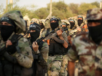 Palestinian militants of the al-Nasser Saladin Brigades take part in a drill in Khan Younis in the southern Gaza Strip September 19, 2017. (