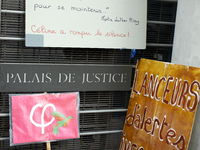 Placards in front of the Toulouse Law Court in support of Celine Boussie, French whistleblower and president of the association 