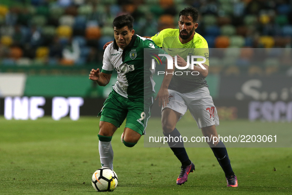 Sportings forward Acuna from Argentine (L) and Maritimo's defender Cristiano Gomes from Portugal (R) during the Portuguese Cup 2017/18 match...