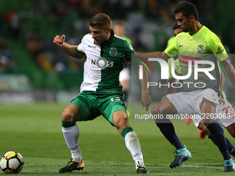 Sportings defender Stefan Ristovski from Macedonia (L) and Maritimo's defender Pablo Santos from Brazil (R) during the Portuguese Cup 2017/1...
