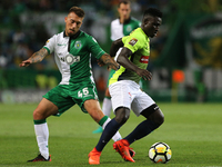 Sportings forward Iuri Medeiros from Portugal (L) and Maritimo's forward Piqueti from Guinea-Bissau (R) during the Portuguese Cup 2017/18 ma...
