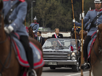 President Bachelet arrives at the ellipse of O'higgins Park to start the traditional military parade.
Chilean President Michelle Bachelet a...