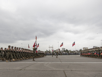 Chilean President Michelle Bachelet attends, for the last time as president, to the traditional military parade in Santiago, Chile, on Septe...