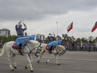 Chilean President Michelle Bachelet attends, for the last time as president, to the traditional military parade in Santiago, Chile, on Septe...
