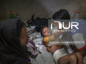 A wounded Rohingya kid is admitted to the hospital as he got burn injury since Myanmar military torched his house.  Cox’s Bazar Hospital, Ch...