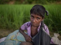 A Rohingya kid looks at the camera at Balukhali, Cox’s Bazar, Chittagong, Bangladesh. September 19, 2017. (