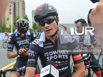 Scott Sunderland from Isowhey Sports Swisswellness speaks to Chinese TV after he wins the second stage of the 2017 Tour of China 2, the 97.6...