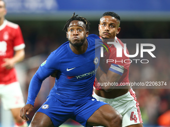 Chelsea's Michy Batshuayi holds of Nottingham Forest's Michael Mancienne
during Carabao Cup 3rd Round match between Chelsea and Nottingham F...