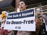PETA animal rights activists protest Bed Bath & Beyond for selling down products.  Los Angeles, California on September 20, 2017. According...