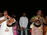 Tamil Hindu musicians play a tune on the nadaswaram as they lead the procession during the Sapparam Festival at a Tamil Hindu temple in Onta...